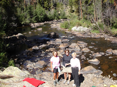 Karen Anne and Sue Weltner by the creek